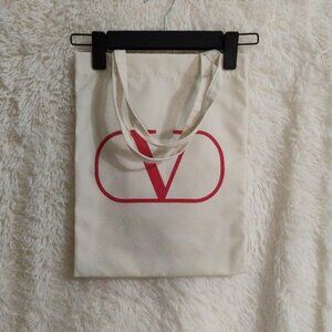 Valentino cream canvas tote bag with a red V-logo NWOT